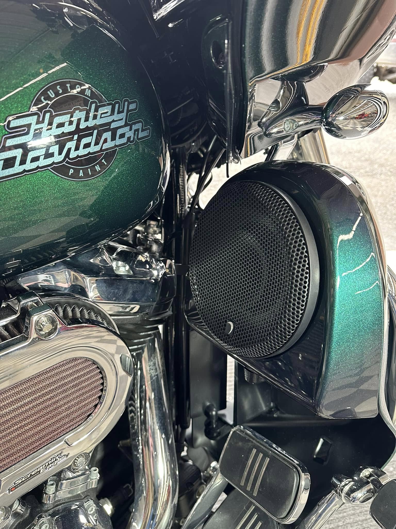 Green Harley custom paint speaker close-up